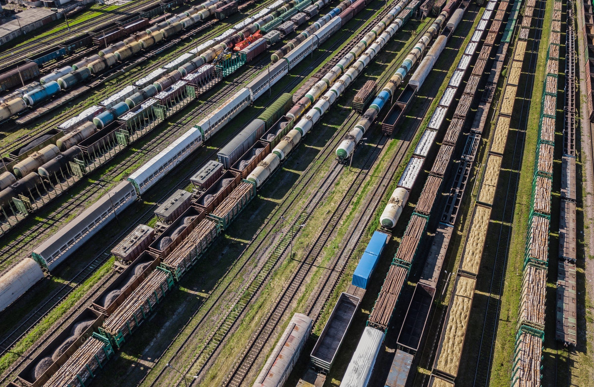 Railcars being transloaded at a bulk terminal